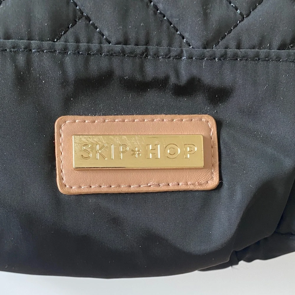 Skip Hop Black Quilted Multifunctional Backpack with Tan and gold accents